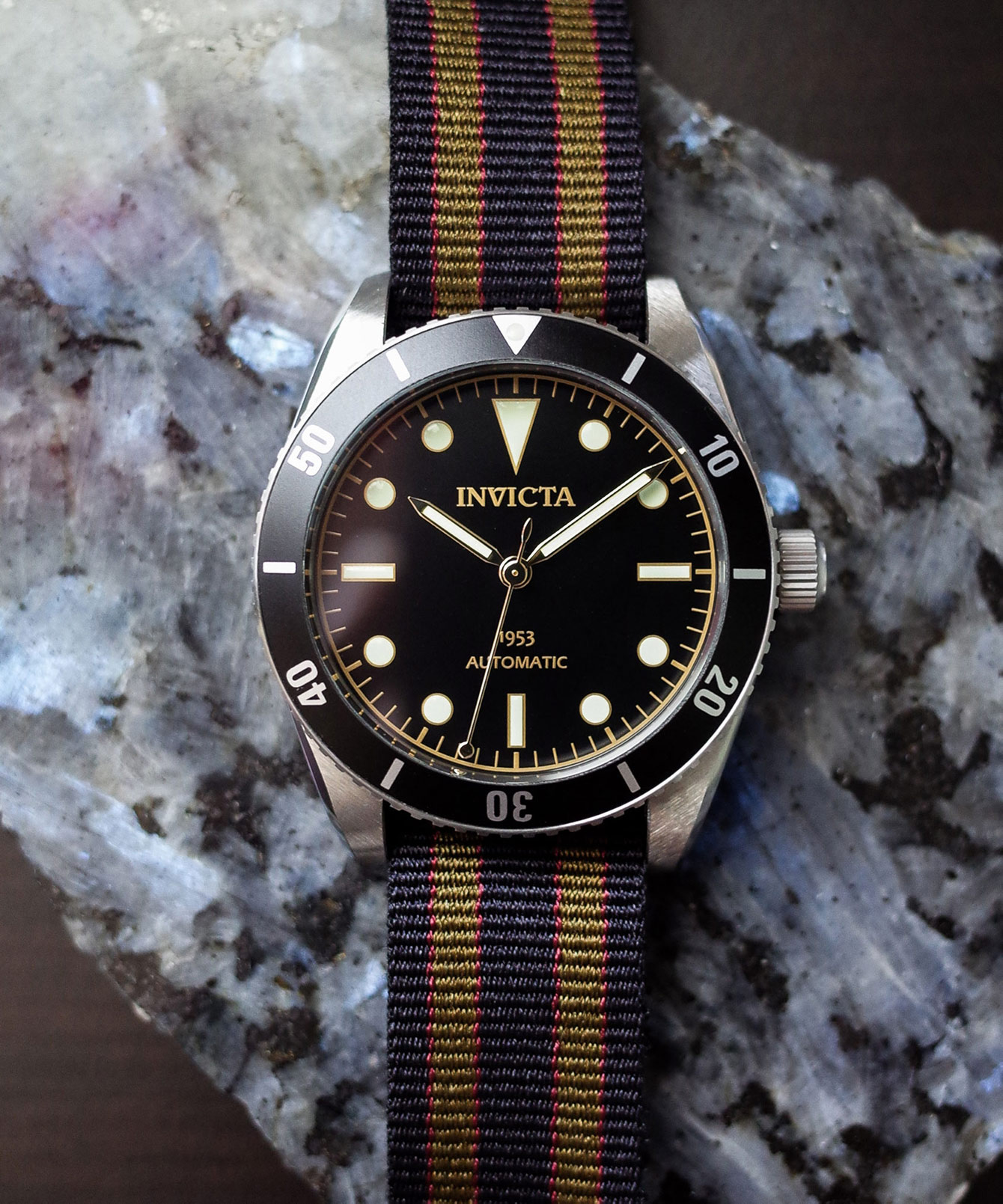 Invicta 1953 Pro Diver on table