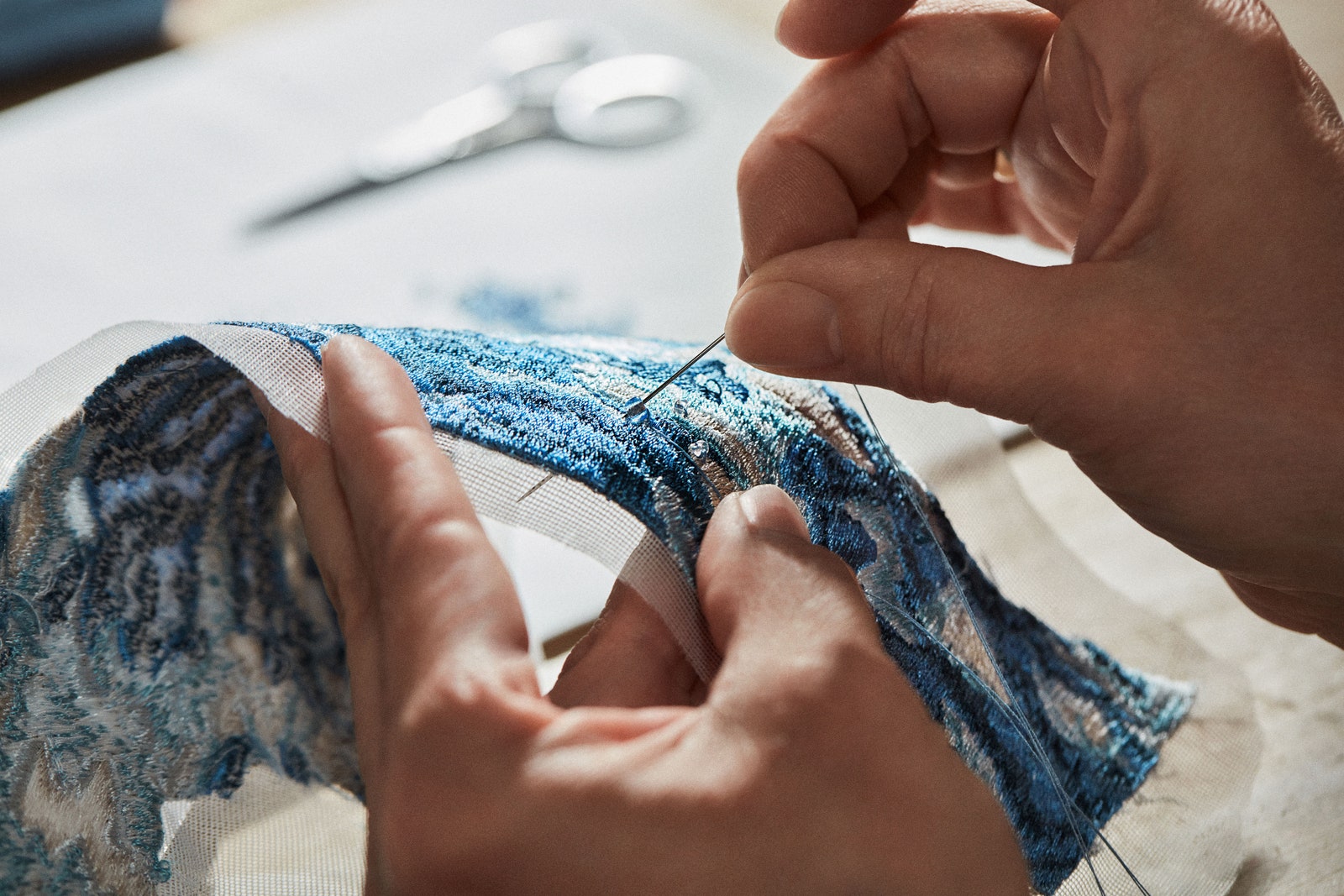 The pool being embroidered.